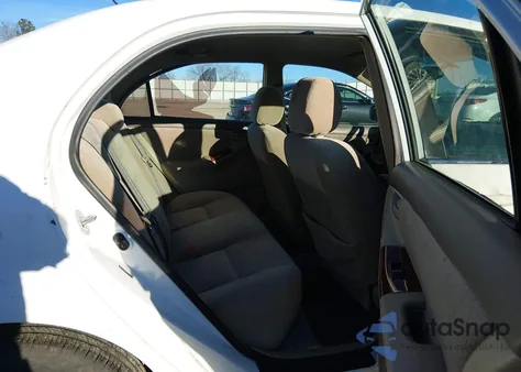 2005 Toyota Corolla Le z USA, uszkodzony, nr VIN 2T1BR32E95C335442